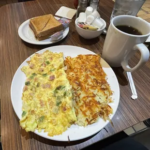 Western Omelette ($13) , comes with Hash Browns, Toast.  Add Coffee($3)