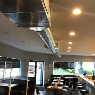 a view of the kitchen and dining area