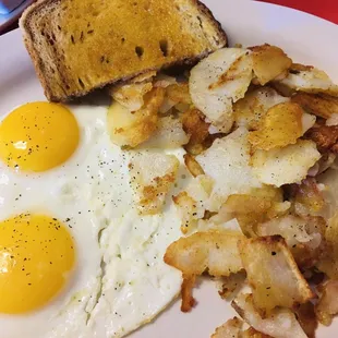 $4 no meat breakfast. great rye toast, A+ potatoes