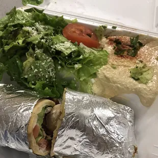 Chicken Shawarma with hummus, pita, and Greek salad to go. Super delicious.