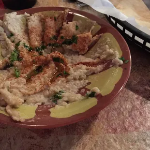 Partially eaten baba ganouj.