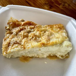 Another gifted dish at the end of our meal, savory baked feta cheesecake