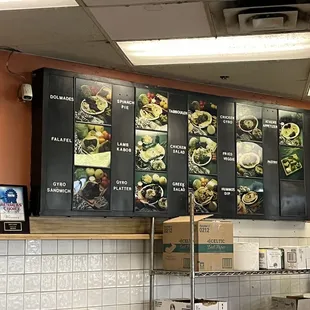 menus on the wall of the restaurant