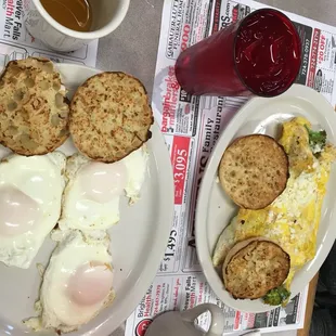 Basted eggs on the left. Broccoli, chicken and cheese omelet on the right.