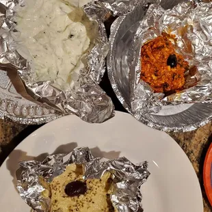 Never ordering from this restaurant again. This is how my appetizer assortment arrived...dips smashed in tinfoil. Practically inedible.