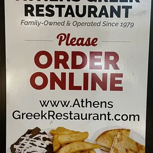 a sign for a greek restaurant