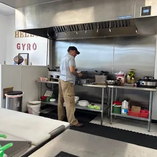 The owner fixing our lunch.