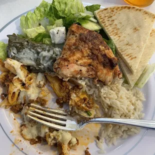 Here is a plate from the buffet! Pastitio,dolmas,salad,Greek chicken!