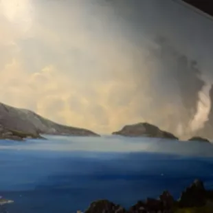a view of a lake and mountains