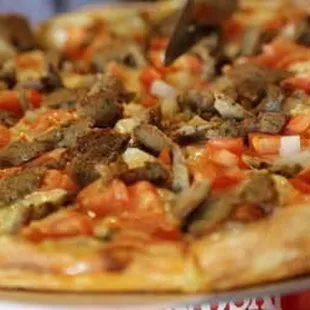 a close up of a pizza