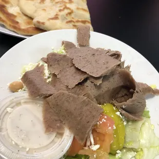 Greek gyro salad with pita