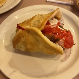 a pita sandwich on a plate