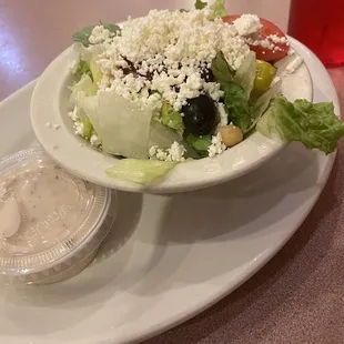 Side Greek salad. Very good. I love the dressing.