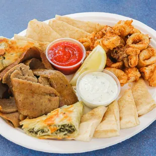 a plate of greek food