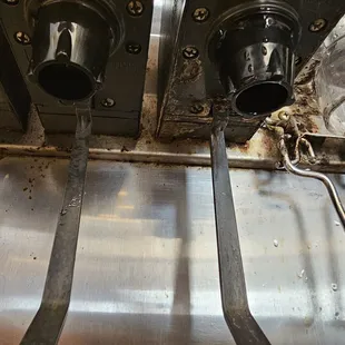 Rust, soda syrup build-up, and mold on the soda fountain. Disgusting!