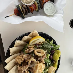 Calamari salad and veggie skewer with hummus