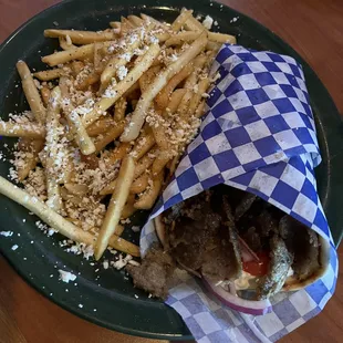 a plate of fries and a sandwich