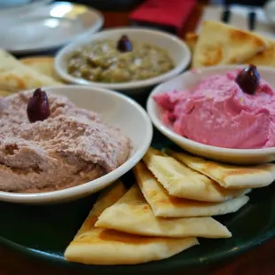 Taramosalata (fish roe), garlic walnut spread, and eggplant spread with pita