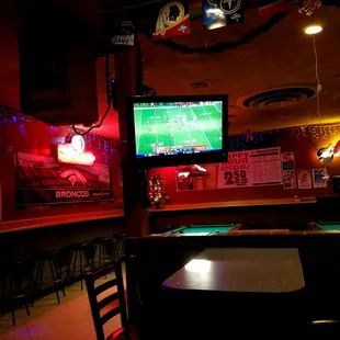 a pool table and television