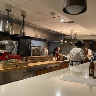 Open kitchen as viewed from the bar