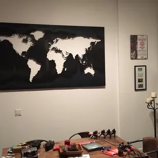 We love our world map steel art piece.