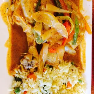 a plate of food with rice and vegetables