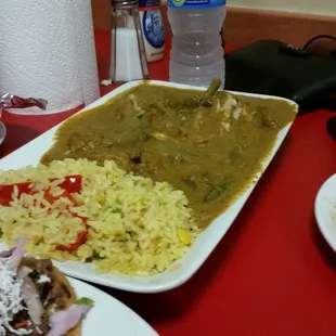 a plate of food on a red table