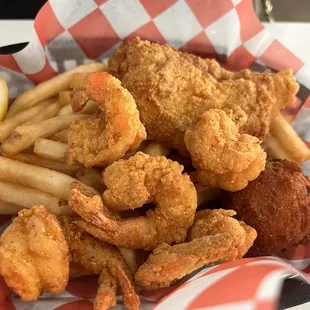 Shrimp and fish plate with fries