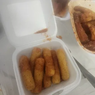 a plastic container with some food in it