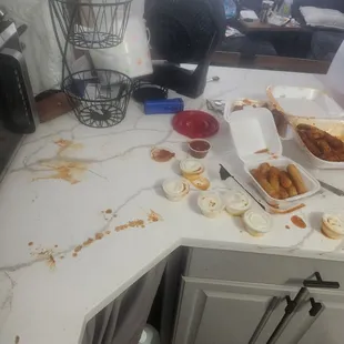 a messy kitchen counter