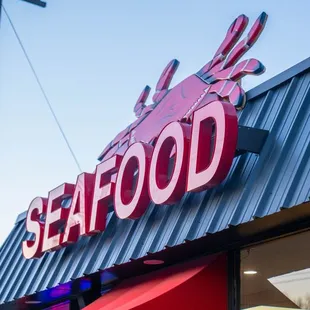 a sign for a seafood restaurant