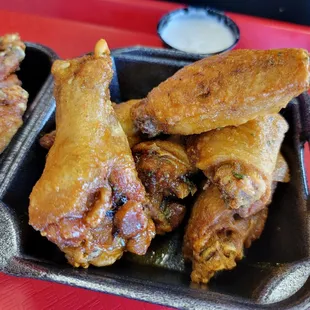 two trays of chicken wings