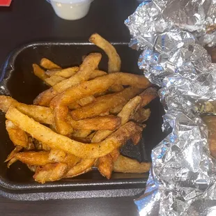 Old greasy fries, not fresh at all. Look like they'd been sitting around awhile.