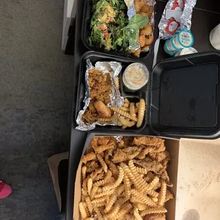 Popcorn shrimp salad, fried oysters, family fish and shrimp platter.