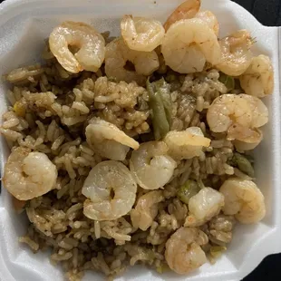 shrimp and rice in a styrofoam container