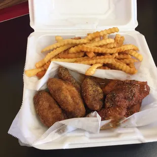 Half Garlic Pepper, Half Mild Garlic Pepper. All breaded, all flats with crispy fries.