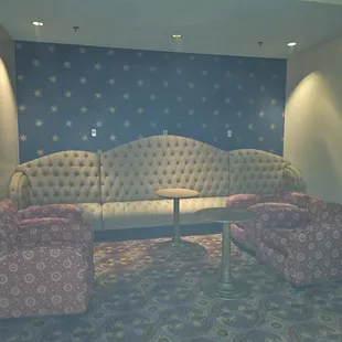 Upstairs area with couches. Nice if you haven't group of people and want to get away from the crowds and the music.
