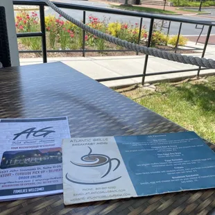 It may be 90 degrees outside...but it's cool under the front porch of Atlantic Grille!