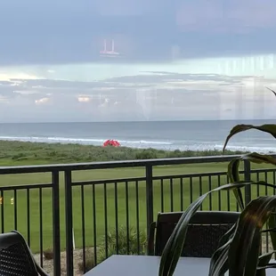 a view of the ocean from a balcony