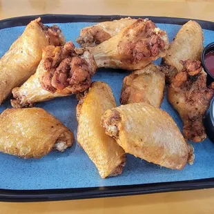 Plain wings with buffalo and blue cheese on the side.