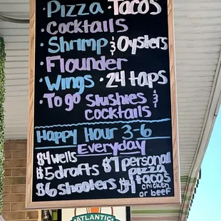 Board outside of the restaurant that said five dollar happy hour beers, but they charge us seven dollars apiece for them