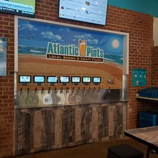 a brick wall with a beer machine