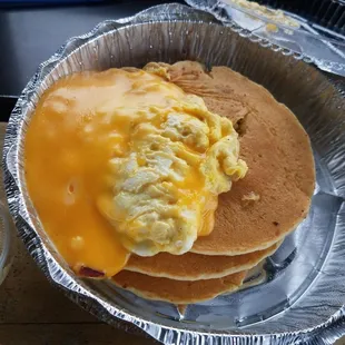 This place never disappoints when it comes to the pancakes egg and cheese always on point