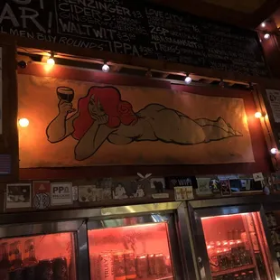 a woman holding a beer