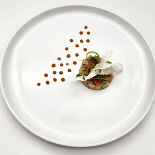 a plate of food on a white table