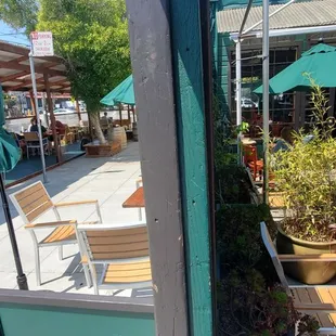 Combined view of the outdoor seating, which includes the sidewalk/street ~10 tables (on the Left) and the patio ~6 tables (on the Right).