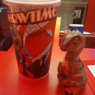 Bob the Raptor says "These concession mammals sell big drinks."
