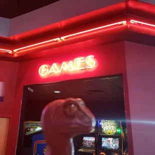 Bob the Raptor says "While you wait for the movie there are arcade games and stuff."