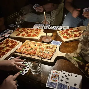 4 Pizza flat breads ($12 per) &amp; Moroccan dry rub wings  ($12)