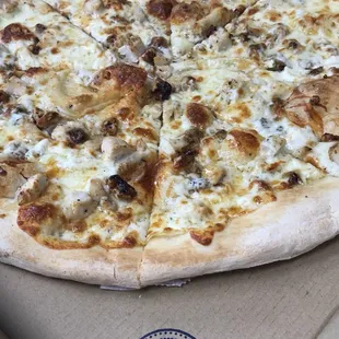The Blonde Pizza.. Chicken, Brie, Candied Walnuts, Mozzarella and a Honey Drizzle!!